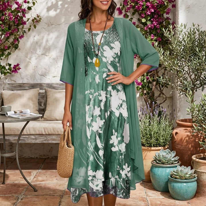 Women's floral midi dress with a sheer cardigan, a stylish 2-piece set for spring & summer.