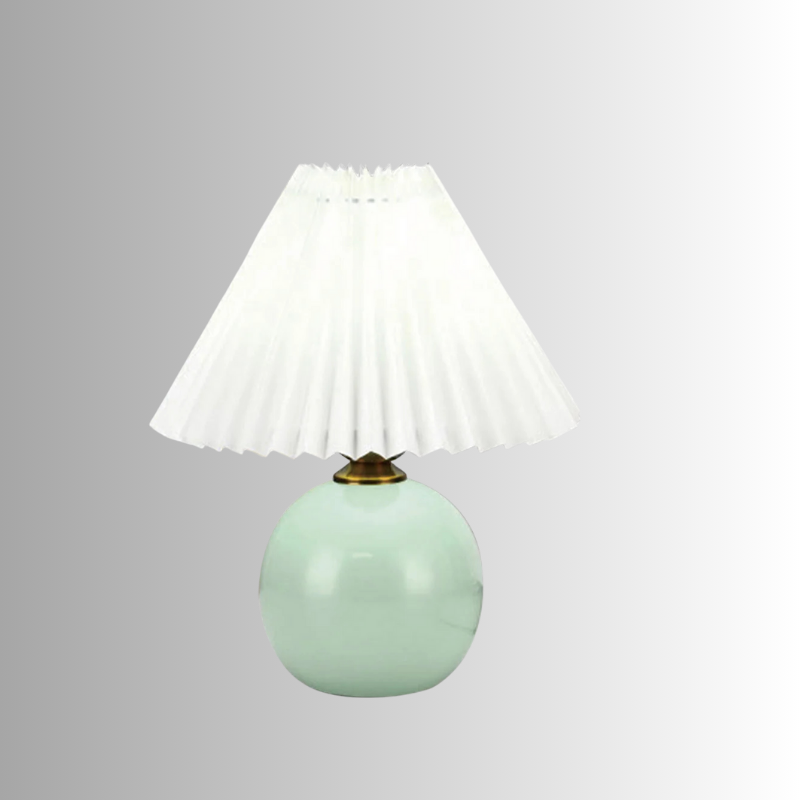 Foldable LED pleated table lamp for modern home decor, perfect for bedside or desk lighting.