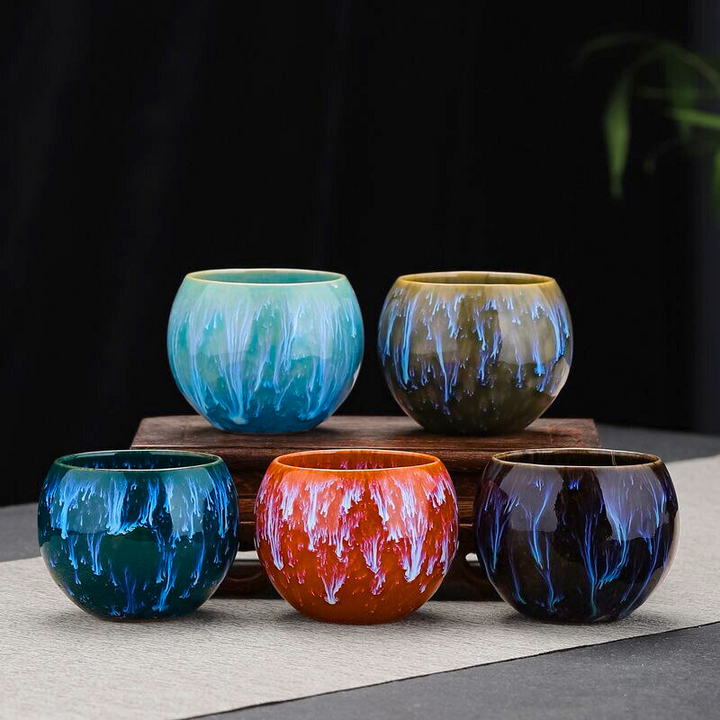 Handmade ceramic dragon teacup set, a unique gift for tea lovers, showcasing Asian artistry & elegant drinkware.