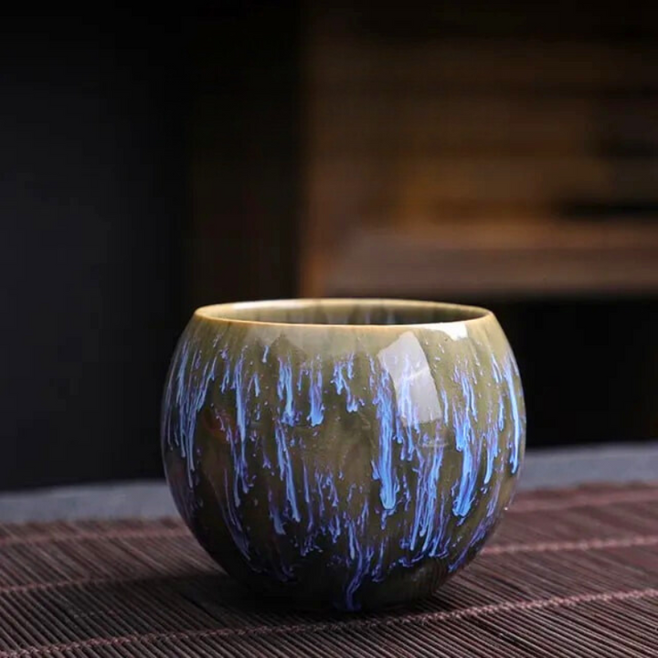 Unique Dragon Egg teacup set, a fantasy-inspired porcelain gift for tea lovers; elegant & mystical drinkware.