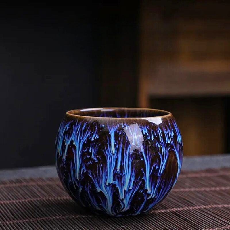 Detailed porcelain Dragon Egg teacup set with textured scales, essential kitchenware for a unique tea experience.