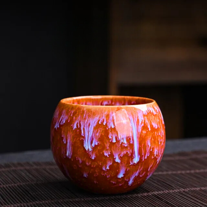 Artistic handmade Dragon Egg teacup set; unique porcelain drinkware, ideal gift for tea enthusiasts & collectors.