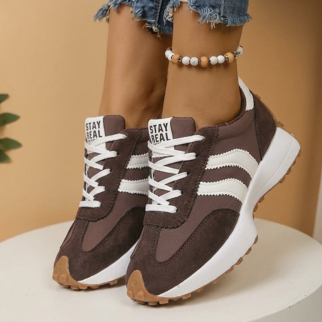 Lightweight women's athletic footwear with orthopedic arch support for ultimate comfort.