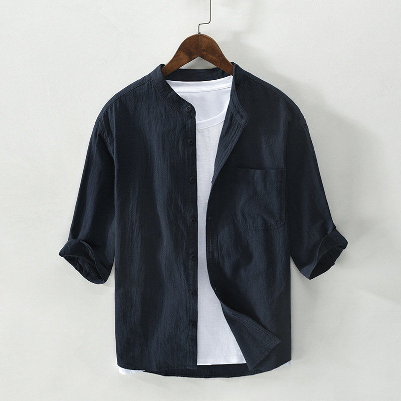 Lightweight men's breathable button-up shirt, relaxed fit, perfect for summer fashion & resort style.