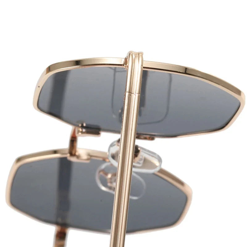 Polished geometric sunglasses, unisex design, an essential fashion accessory for all.