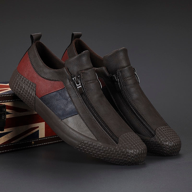 Close-up of men's color block sneakers, highlighting textured sole & cushioned interior.