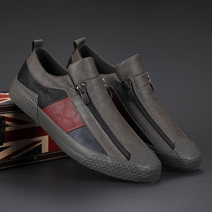 Detail of the modern color block upper on men's cushioned fashion sneakers.