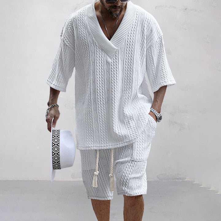 Coordinated men's V-neck shirt & shorts matching set in a relaxed style, ideal for summer comfort.