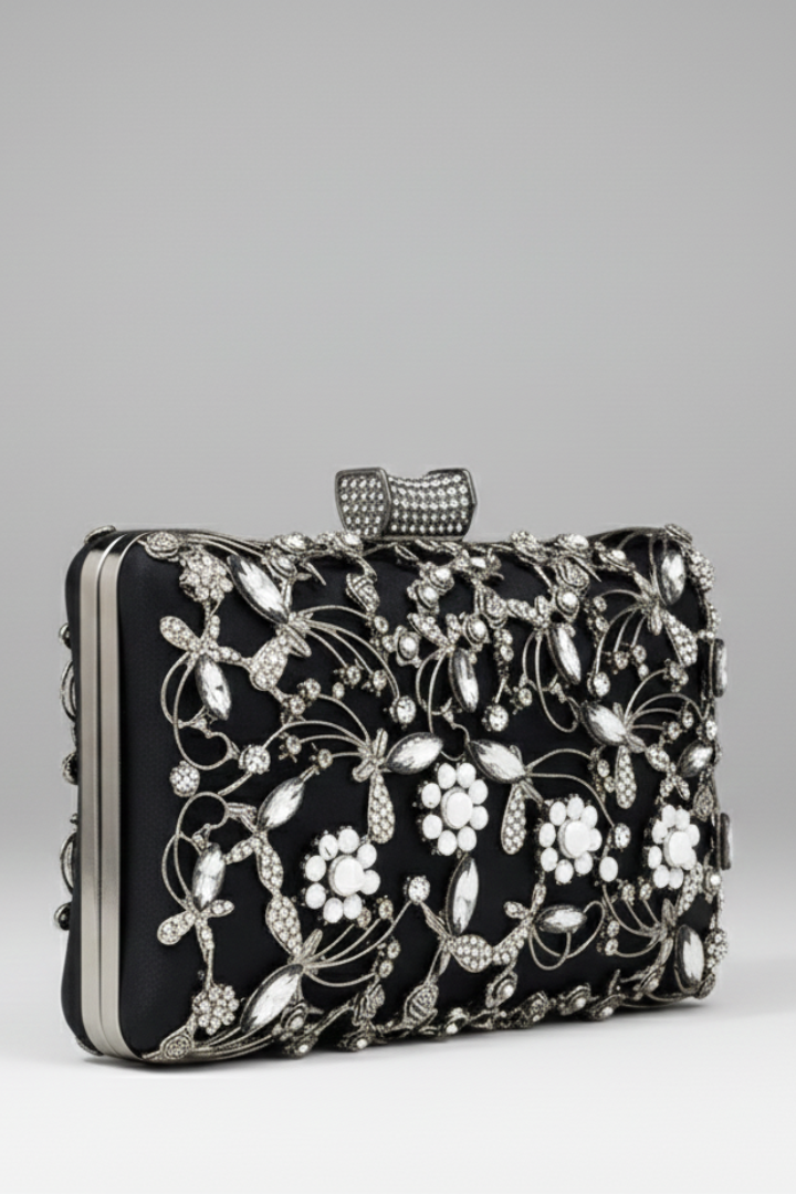 Elegant women's evening clutch with intricate embroidery & shimmering decorative stones, perfect for special occasions.