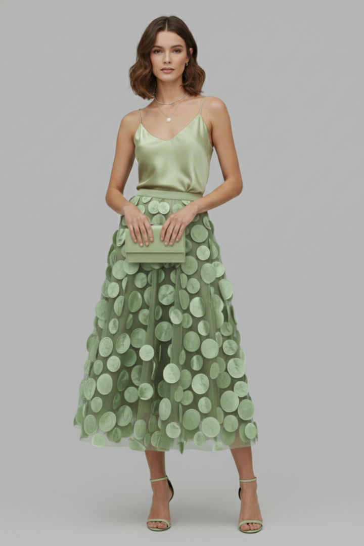 Fashionable women's polka dot full skirt, a versatile midi with elastic waist for modern style.