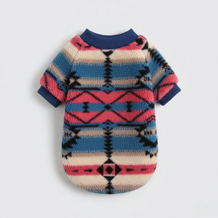 Detail shot of the soft, thick material of a striped plush dog winter sweater.