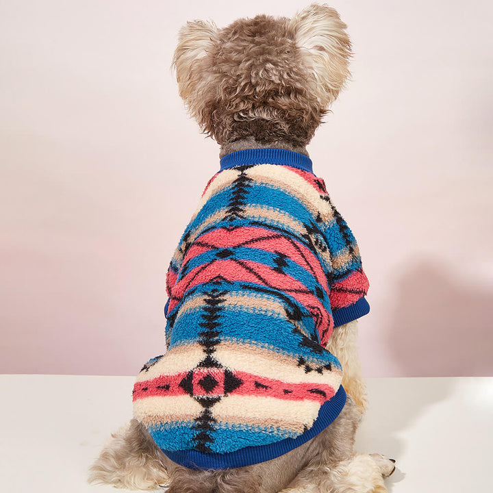 Stylish pet fashion: striped plush winter sweater for dogs, shown on a hanger.