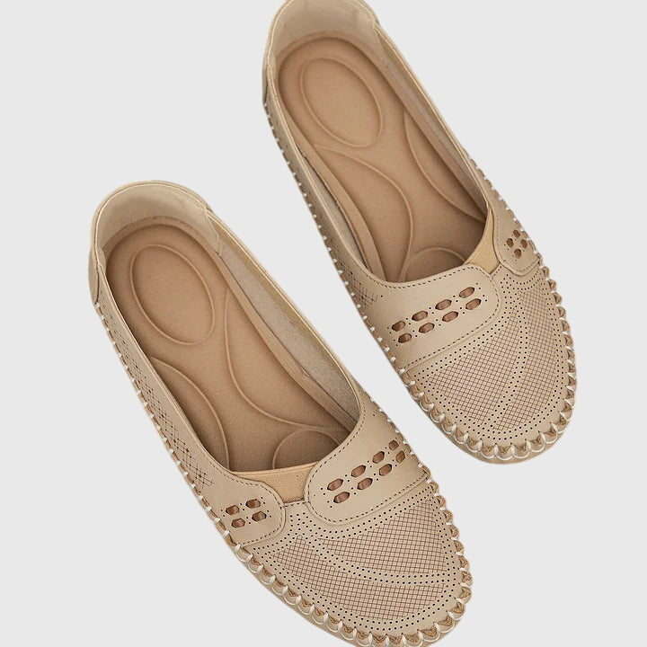 Breathable women's walking shoes, orthopedic slip-ons providing all-day foot support.