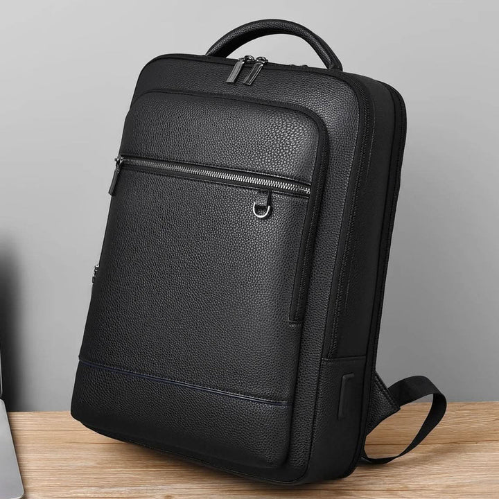 PU leather smart commuter bag, an efficient USB backpack for organizing work and travel items.