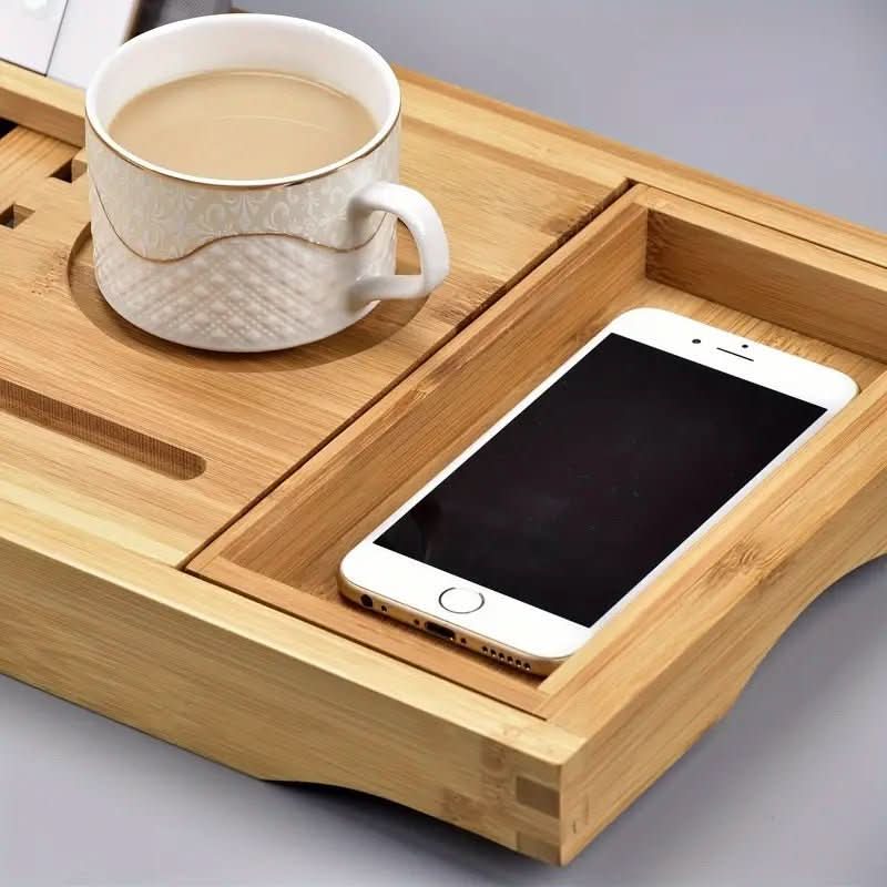 Eco-friendly adjustable bamboo bathtub caddy, a versatile spa organizer & bath accessory for relaxation.