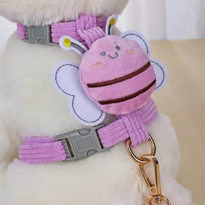 Side view of the adjustable dog harness with bee motif, designed for comfort and security on walks.