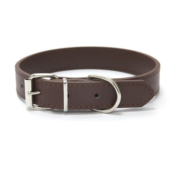 Blue solid color dog collar, PU leather, padded for luxurious comfort, adjustable fit.
