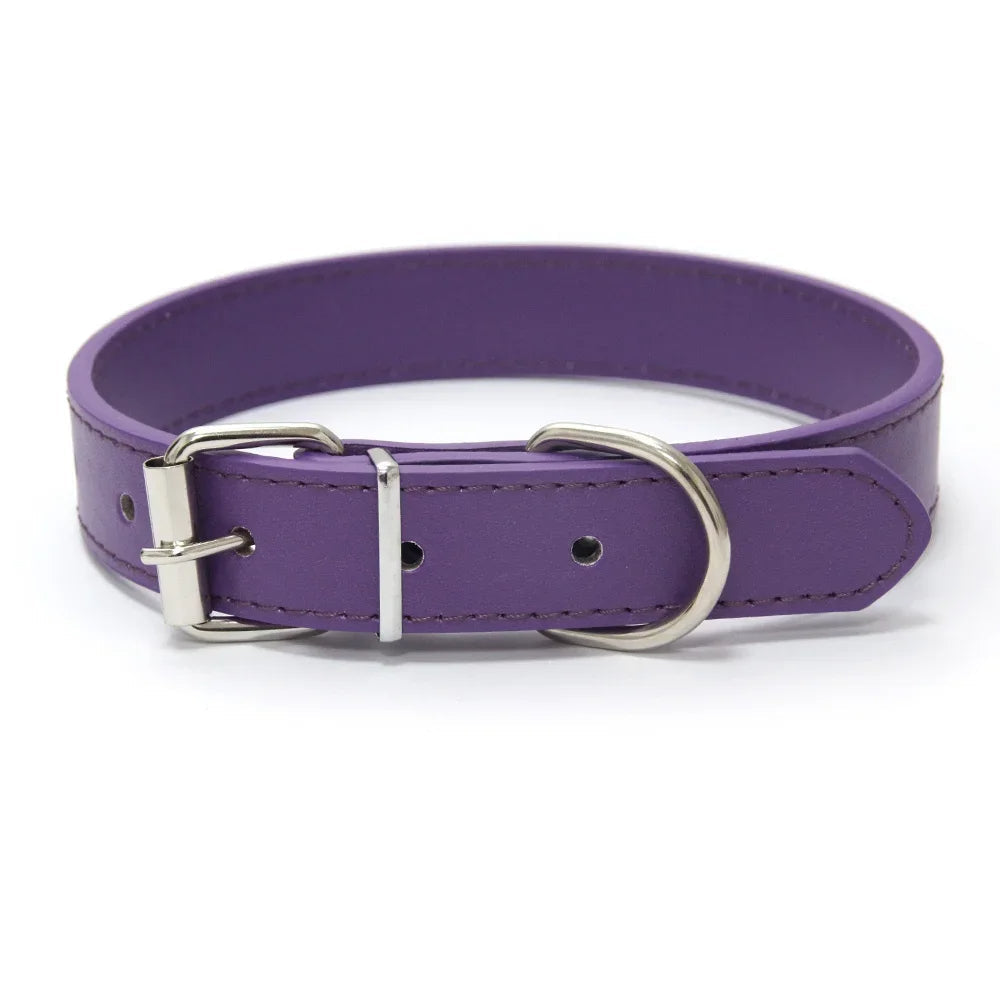 Black solid color padded dog collar, PU leather, adjustable for ultimate pet comfort.