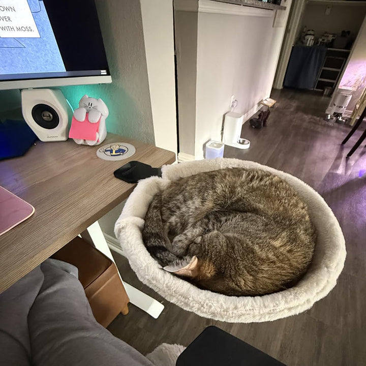 Adjustable cat bed for desks made with soft gray faux fur, providing an elevated pet comfort spot.