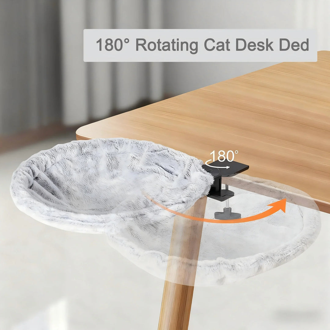 Cat enjoying a nap on a white faux fur desk bed, an ideal space-saving pet perch for desks.