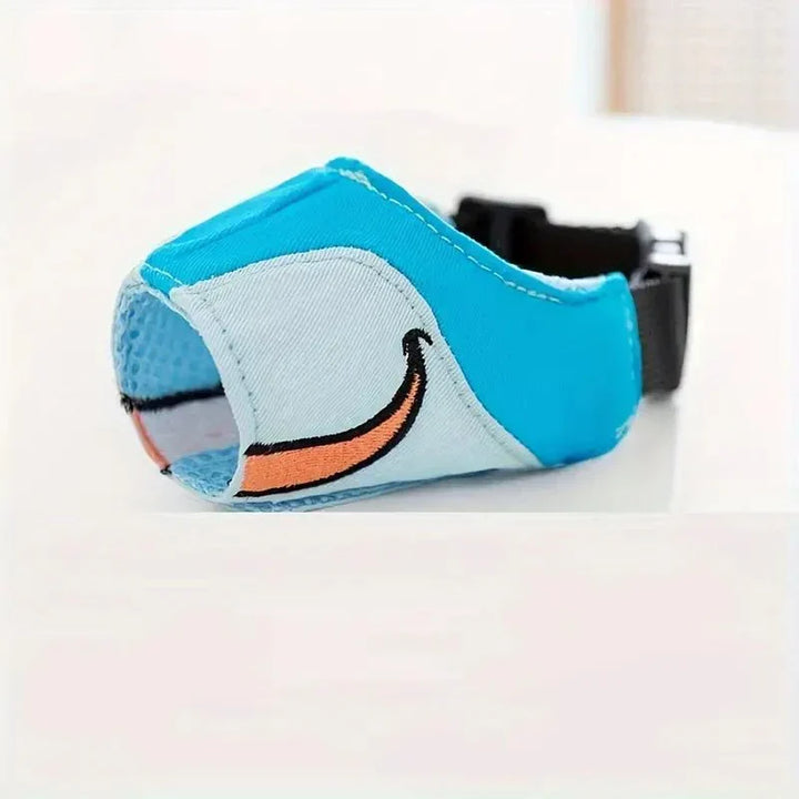 Comfortable dog muzzle, a training aid pet accessory. Adjustable design for safety, anti-bark & chew prevention.