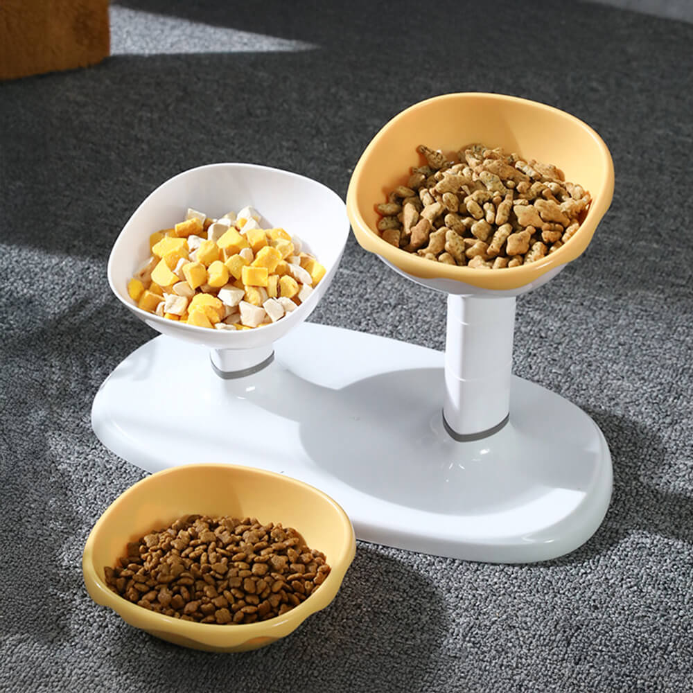 Close-up of a white adjustable double pet feeding bowl showing ceramic bowls and anti-slip base for pets