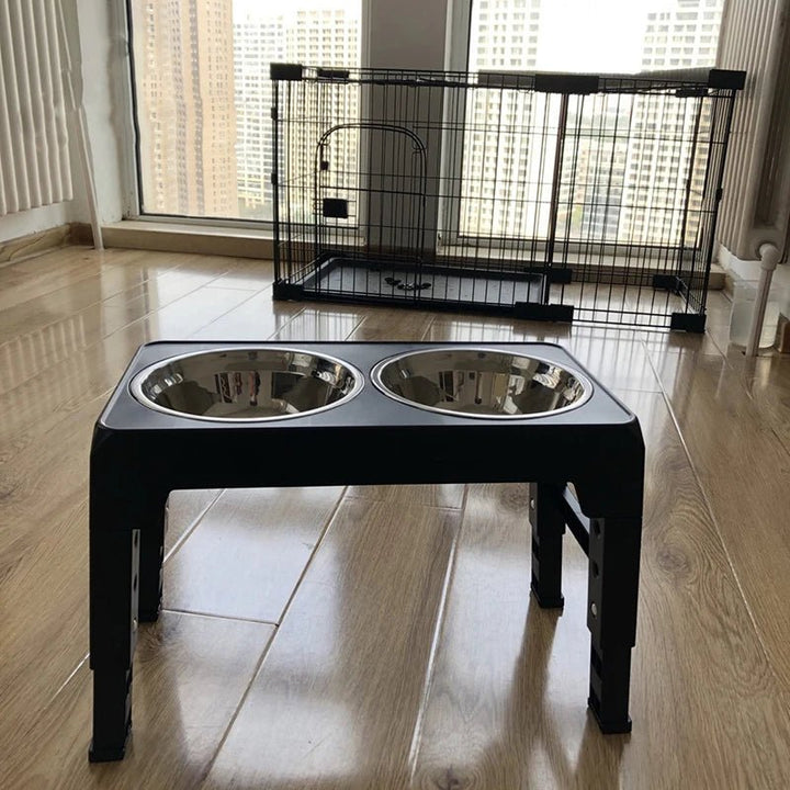 Versatile elevated dog feeder with multiple height settings and two stainless steel bowls for pet supplies.