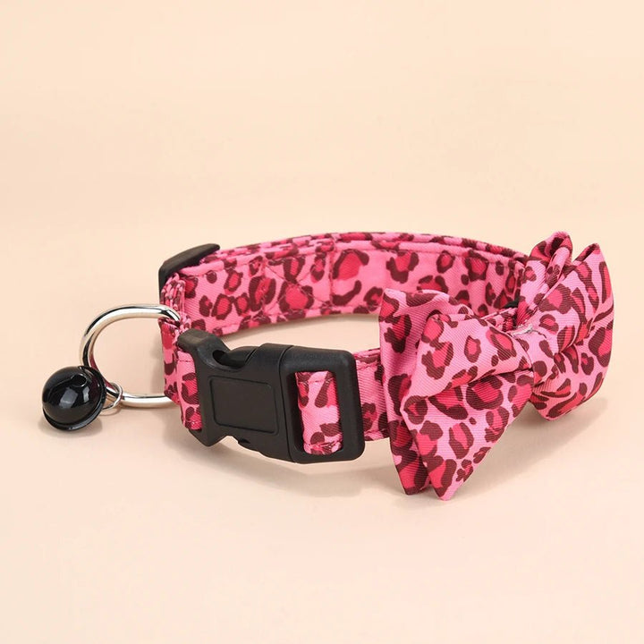 Leopard print pet collar: Adjustable twill fabric dog or cat collar featuring a bow and bell, ideal for small animals.