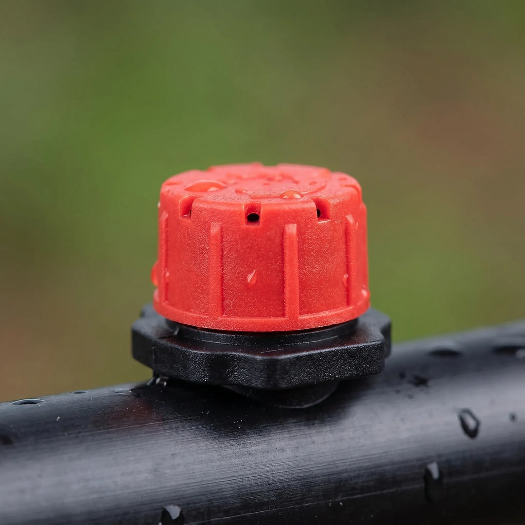 Set of flexible micro drippers for automatic watering systems in home gardens, perfect for various plants.