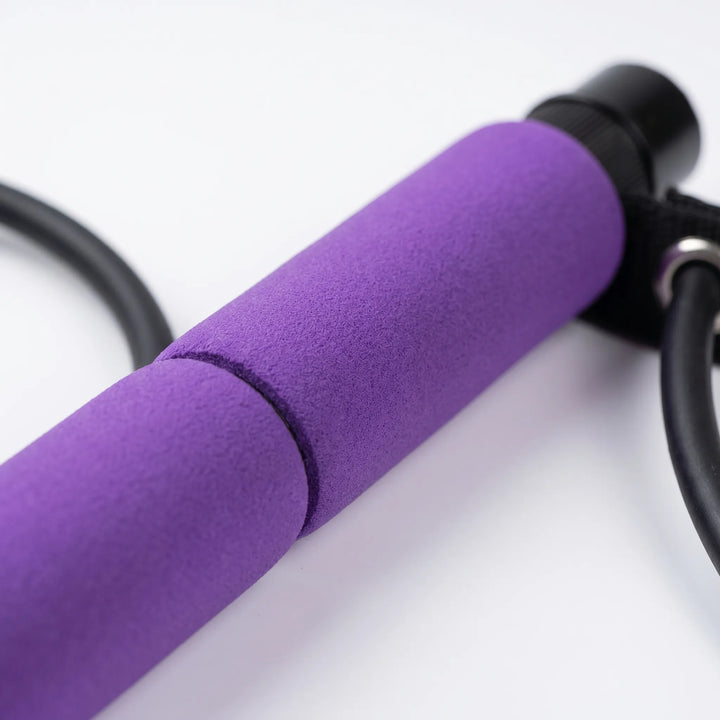 Unisex adjustable Pilates stick with resistance bands for versatile home fitness, yoga, and full-body exercise.