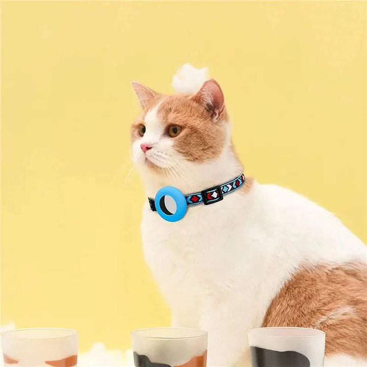 Close-up of reflective adjustable cat collar showing tracker holder and durable nylon
