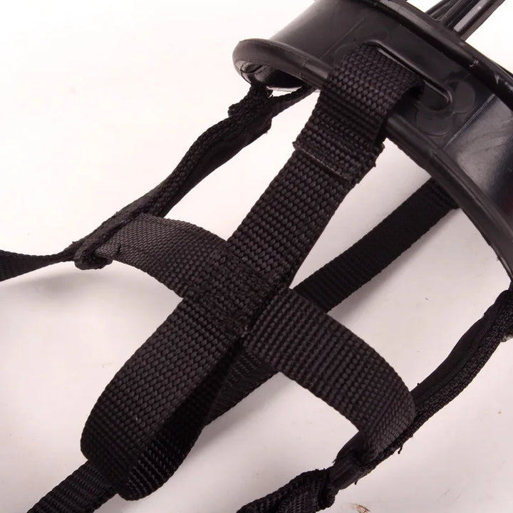 Silicone no-bite dog muzzle, adjustable for effective anti-bark training & safe outdoor walks. A durable pet accessory.
