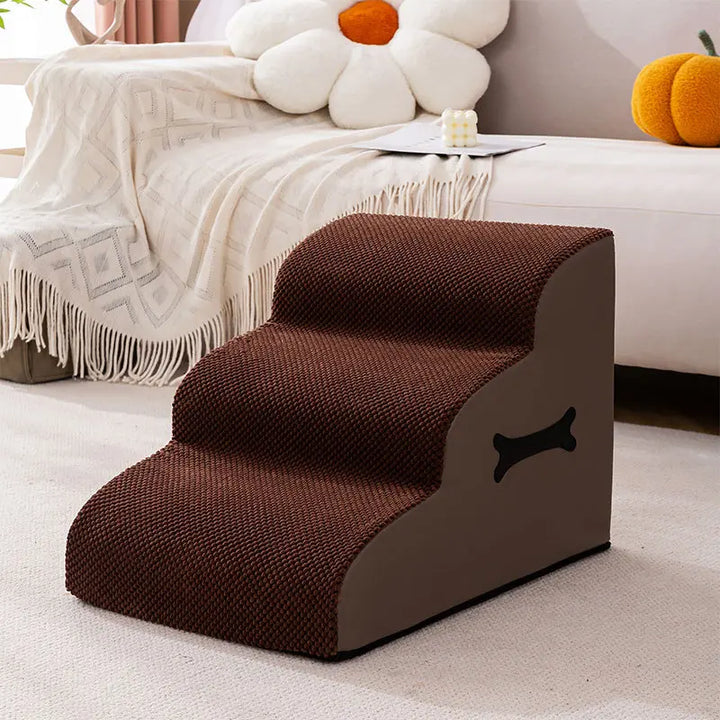 Small fluffy dog descending gentle ramp of soft non-slip pet stairs, comfy and safe