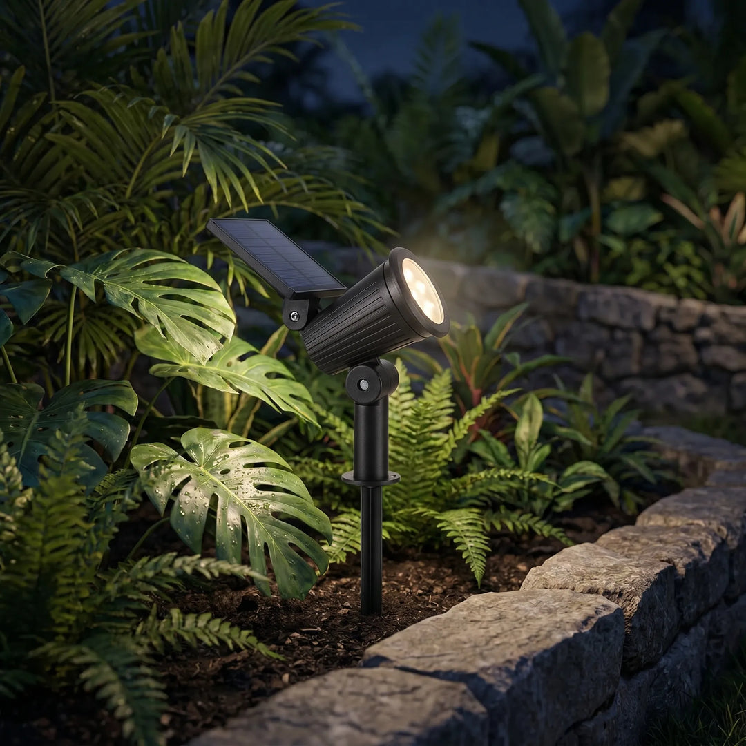 Adjustable solar LED spotlight for garden & pathway illumination, energy-efficient.