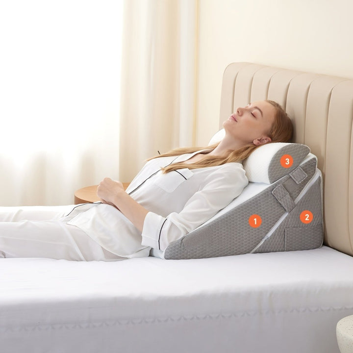 Ergonomic wedge pillow offering back & leg elevation for pain relief & improved circulation.