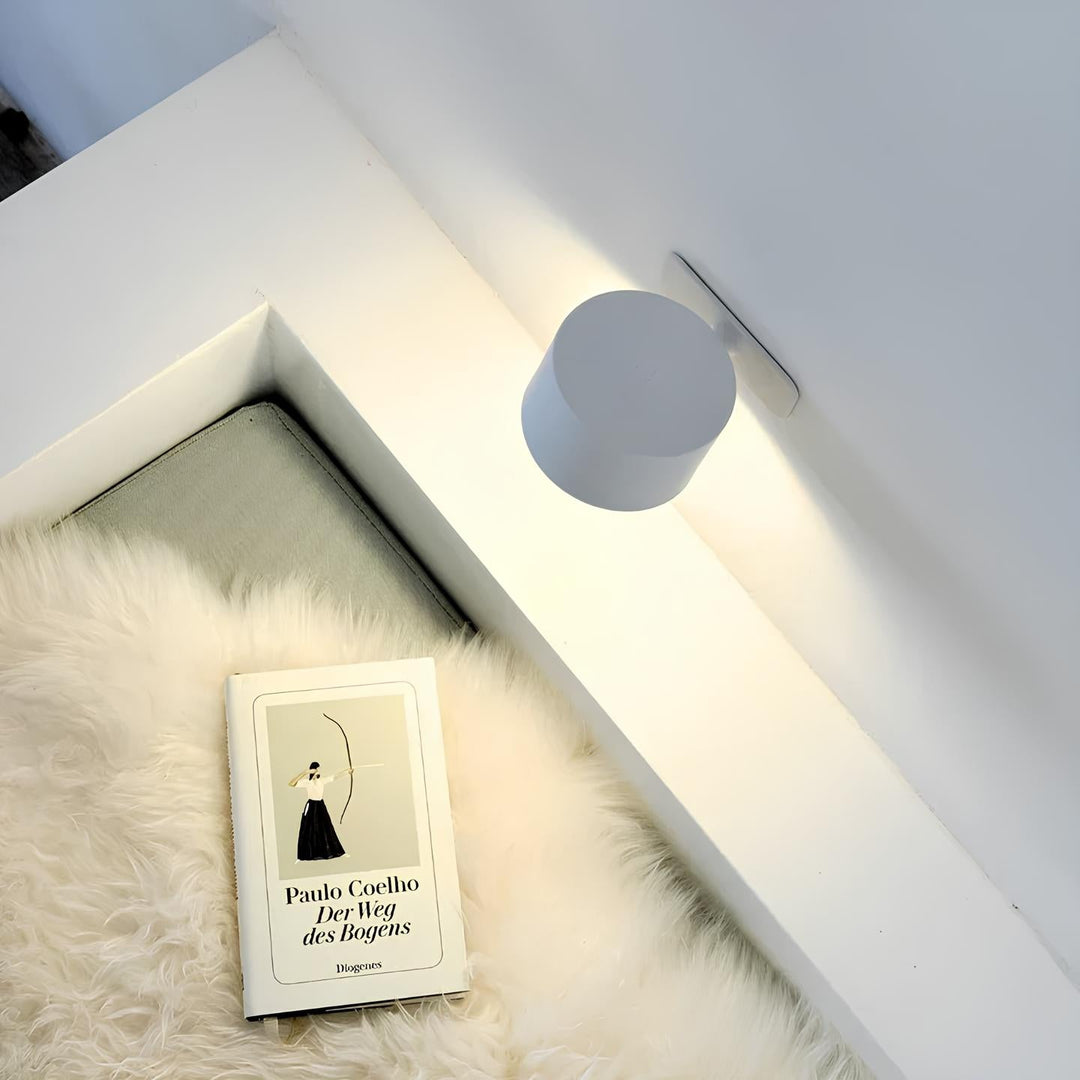 Versatile LumoFlex wireless wall light, adjustable head, provides focused or ambient LED lighting