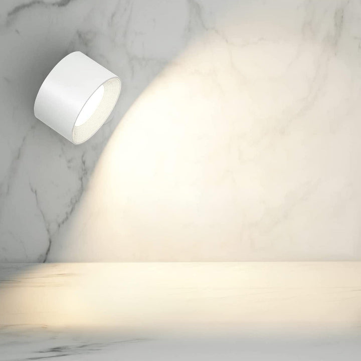 Easy-to-install LumoFlex wireless wall lamp, rechargeable, provides bright, adjustable LED illumination