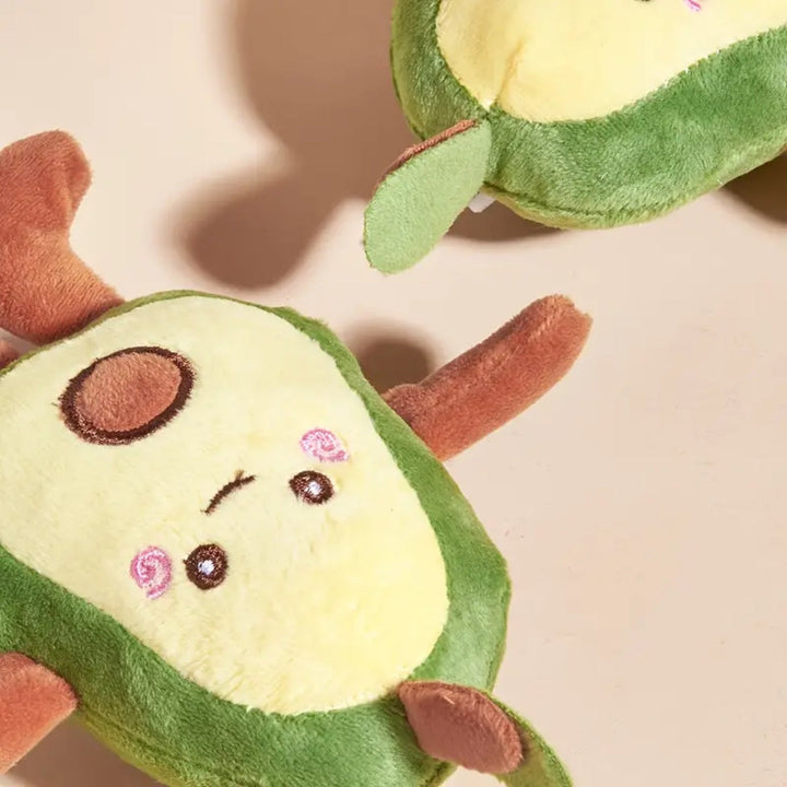 Vibrant green avocado plush toy, a robust and entertaining squeaky companion for your pet