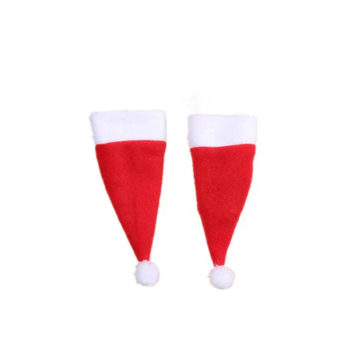 Close-up of a festive pet costume: a red and white Christmas hat and scarf for pets