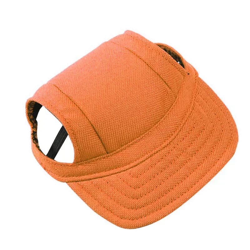 Owner playfully adjusting a yellow Unisex Pet Sun Protection Baseball Cap on their dog, pet accessories