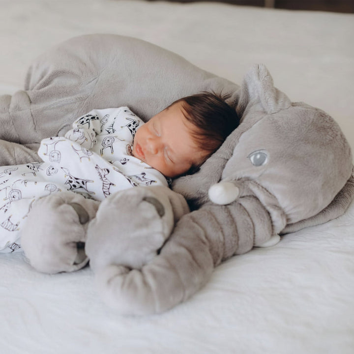 Unisex elephant plush cuddle pillow, ideal for nursery decor & kids' playtime. Soft toy for toddlers.