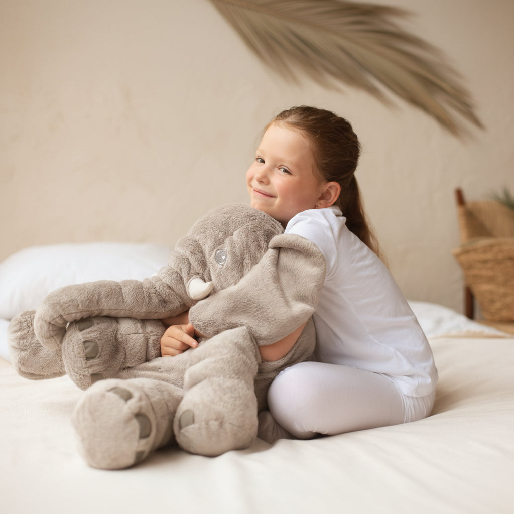 Soft elephant baby pillow, plush toy for toddlers. Adorable nursery decor & kids' gift.