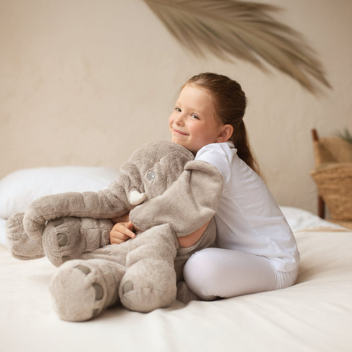 Soft elephant baby pillow, plush toy for toddlers. Adorable nursery decor & kids' gift.