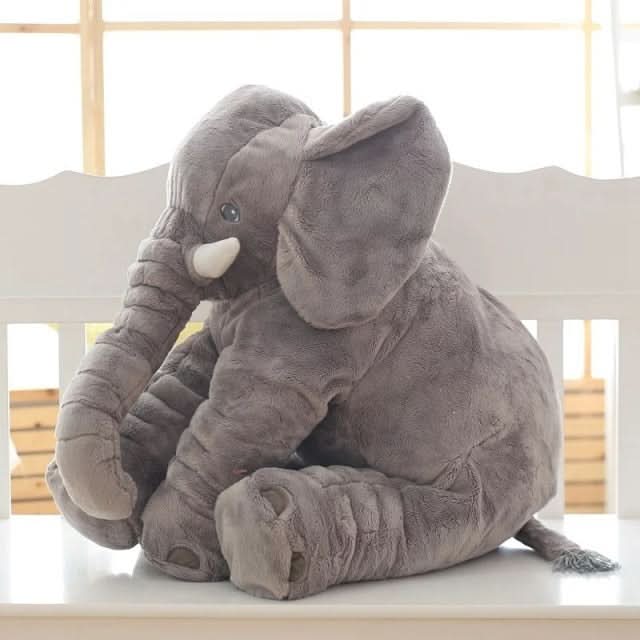 Grey elephant plush toy, perfect as a cuddle pillow for kids. Soft stuffed animal for baby nursery.