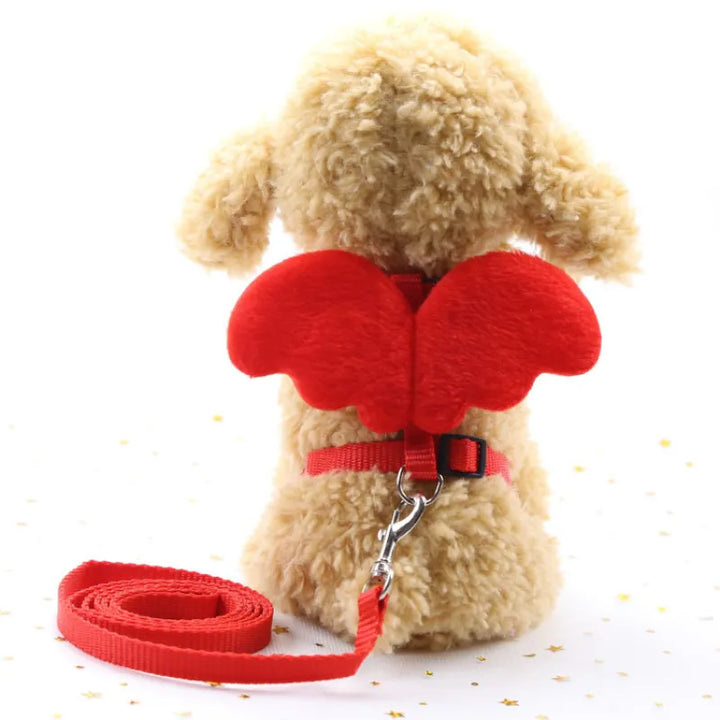 Adorable pink pet harness with angel wings and leash for small dogs or cats, adjustable and cute.