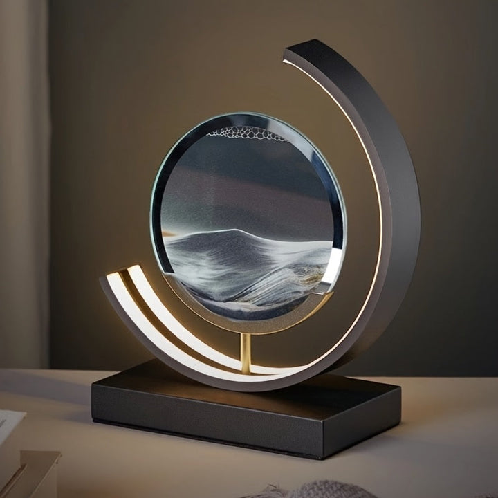 Decorative LED hourglass lamp with illuminated flowing sand art, adds unique charm to any space.
