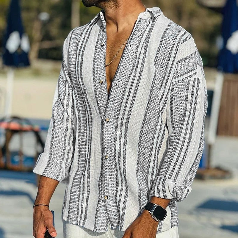 Relaxed fit men's striped long sleeve shirt, perfect for summer. Casual button-down menswear for stylish comfort.