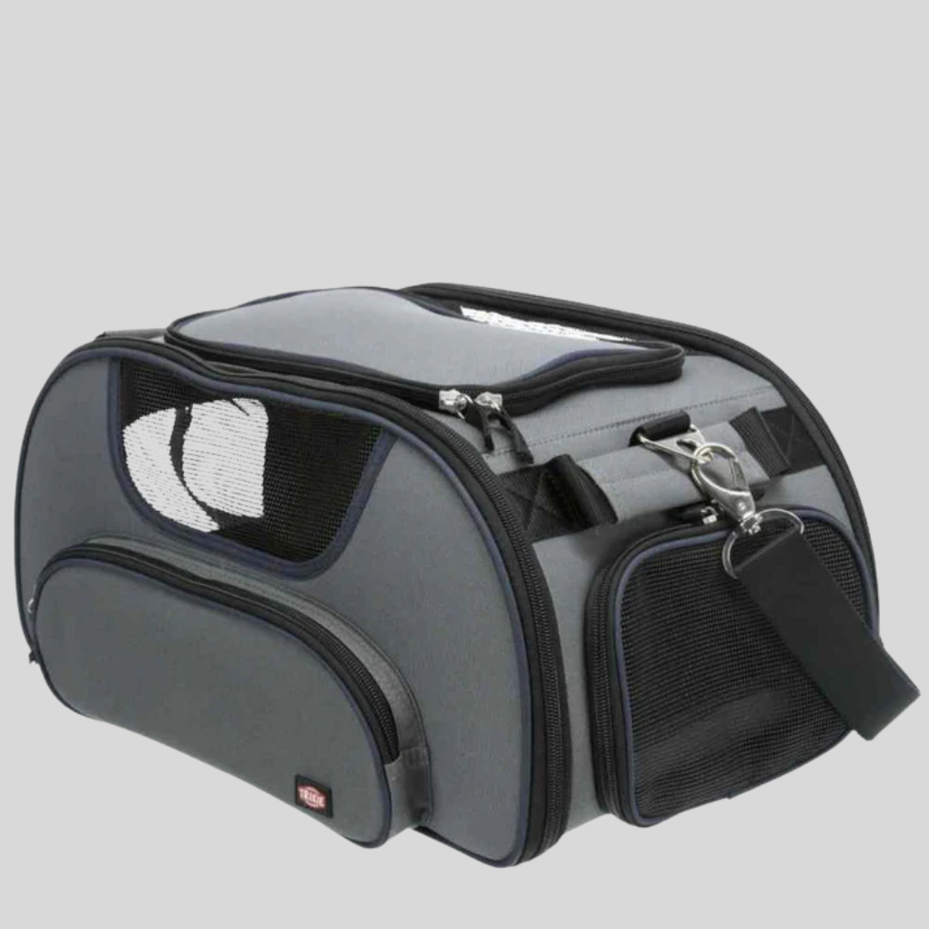 Airline approved pet carrier, gray, for small dogs and cats, with mesh windows, side view.