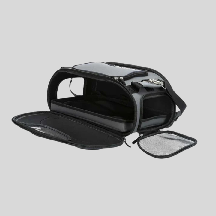 Foldable pet travel crate with soft fleece bedding, airline compatible for small pets.