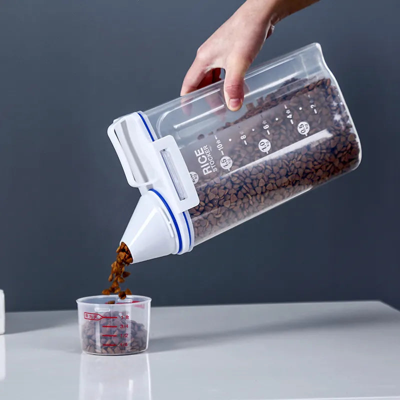 White airtight food storage container with secure locking lid and integrated measuring cup for kitchen storage.